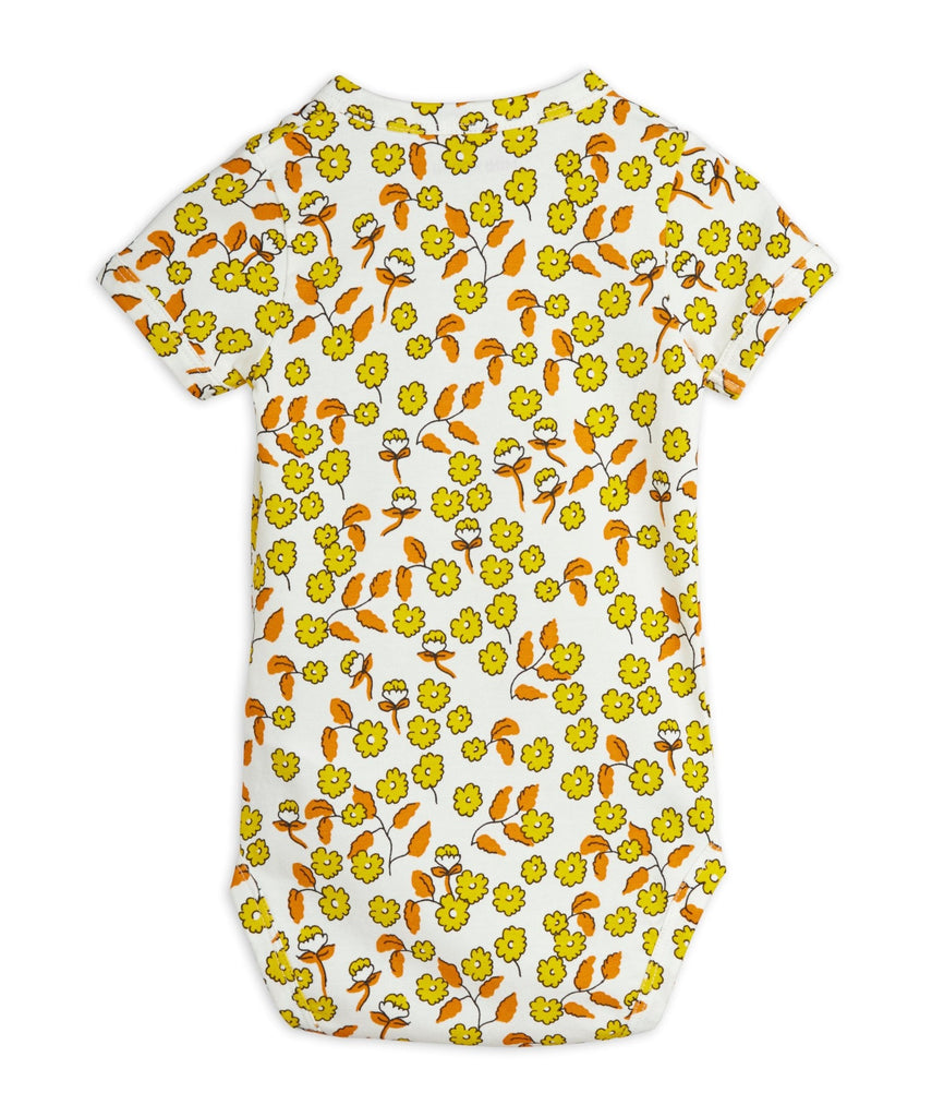 Mini Rodini Flowers Short Sleeve Onesie | on Off-white backing | sizes up to 18 months | Snap close at shoulder and legs - backMini Rodini Flowers Short Sleeve Onesie | on Off-white backing | sizes up to 18 months | Snap close at shoulder and legs - back