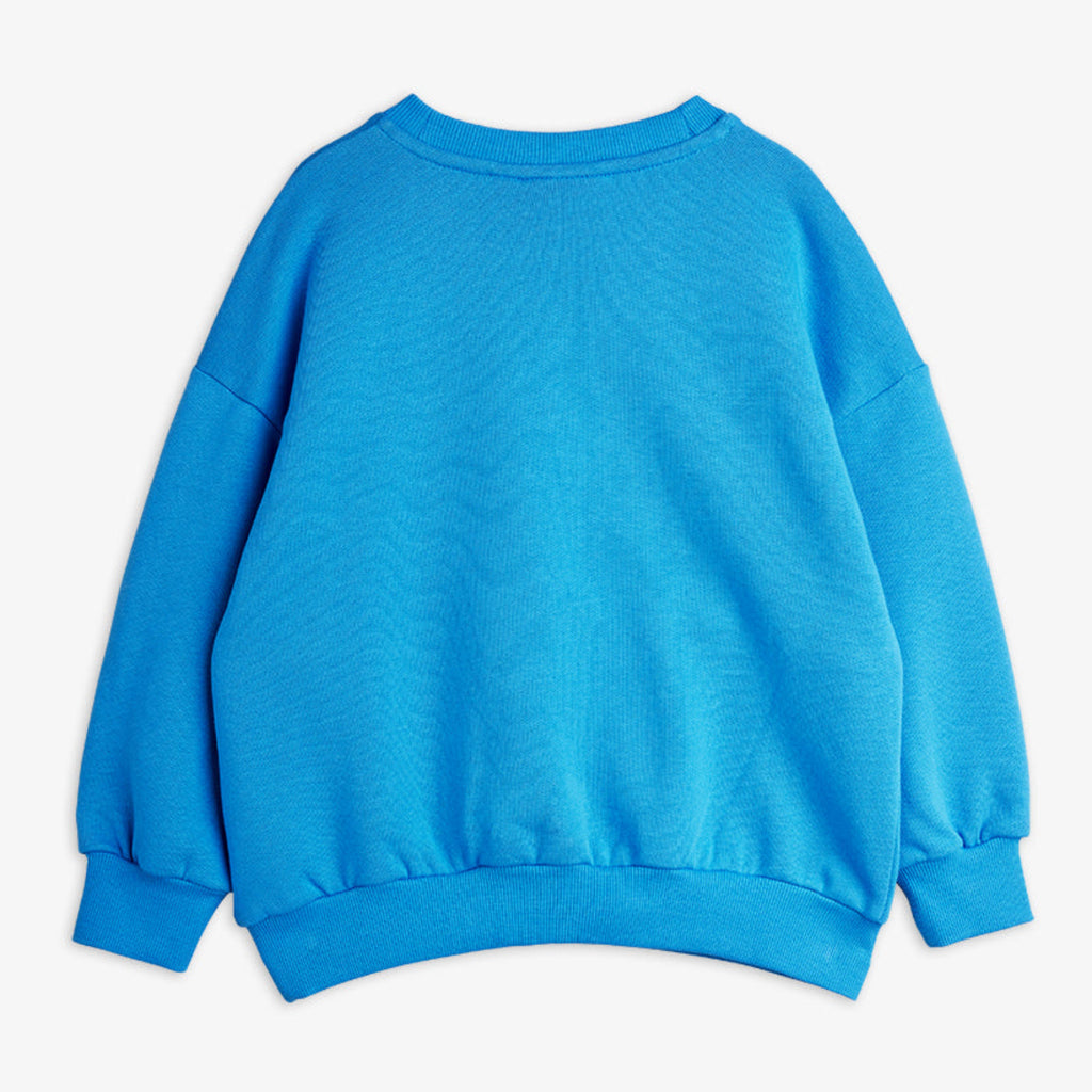 Aqua blue cotton sweatshirt with white panel and Mini Rodini iconic panther print. Relaxed fit for kids to 11 years | back of shirt
