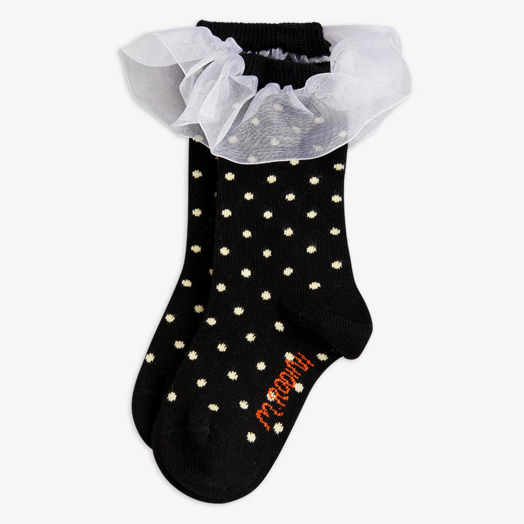 Black socks with white dots and a white ruffle at the top | mid calf height | Up to ages 5 years | all cotton