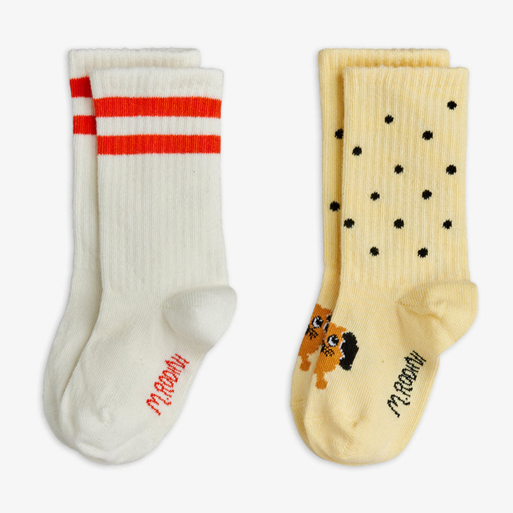 2-pak sox for infant/toddler; up to 3 years | one yello pair with black dots; the 2nd a white pair with red stripes at the top