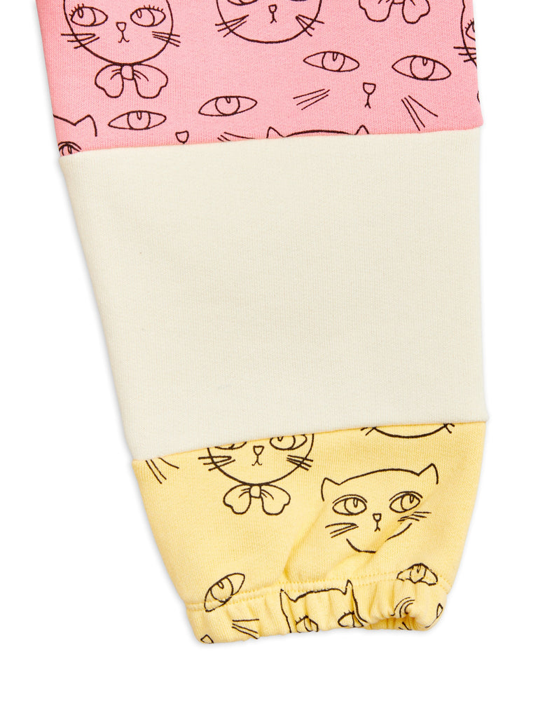 Mini Rodini 3 Panel Cat Print Sweatpant | Pink/White/Yellow | Elastic waist and ankle - closeup