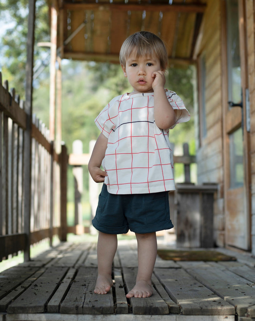 Organic Cotton Short Sleeve Tee in Red/Yellow Grid Print | Happy Days Motif on Front | Button Close at Shoulder on Smaller Sizes - infant pic