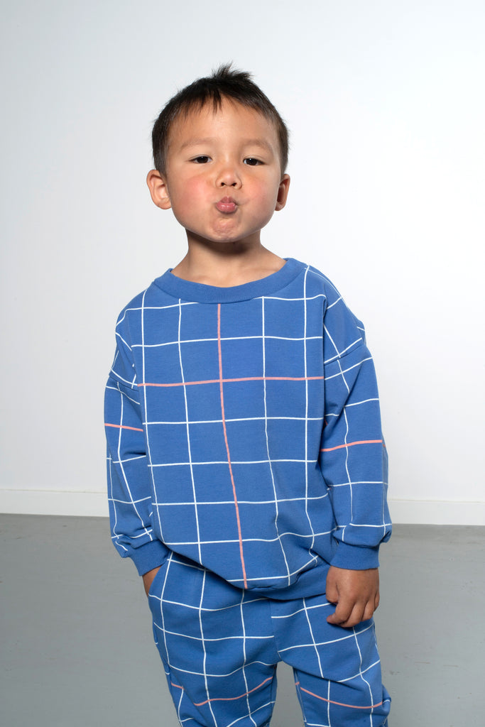 Organic Cotton Blue Sweatshirt in white/red grid print | Infant to Size 10 | Shoulder Button close on infant sizes | Top Quality and Ultra Comfortable   - Model pic