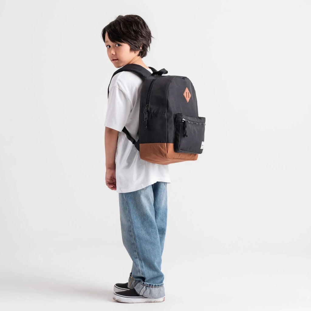 Herschel Youth Backpack | styled for 8-12 years | black Stencil Check | laptop sleeve | front pocket | water bottle holder  | made from recycled fabrics | 15"(H) x 12"(W) x 5.75"(D)