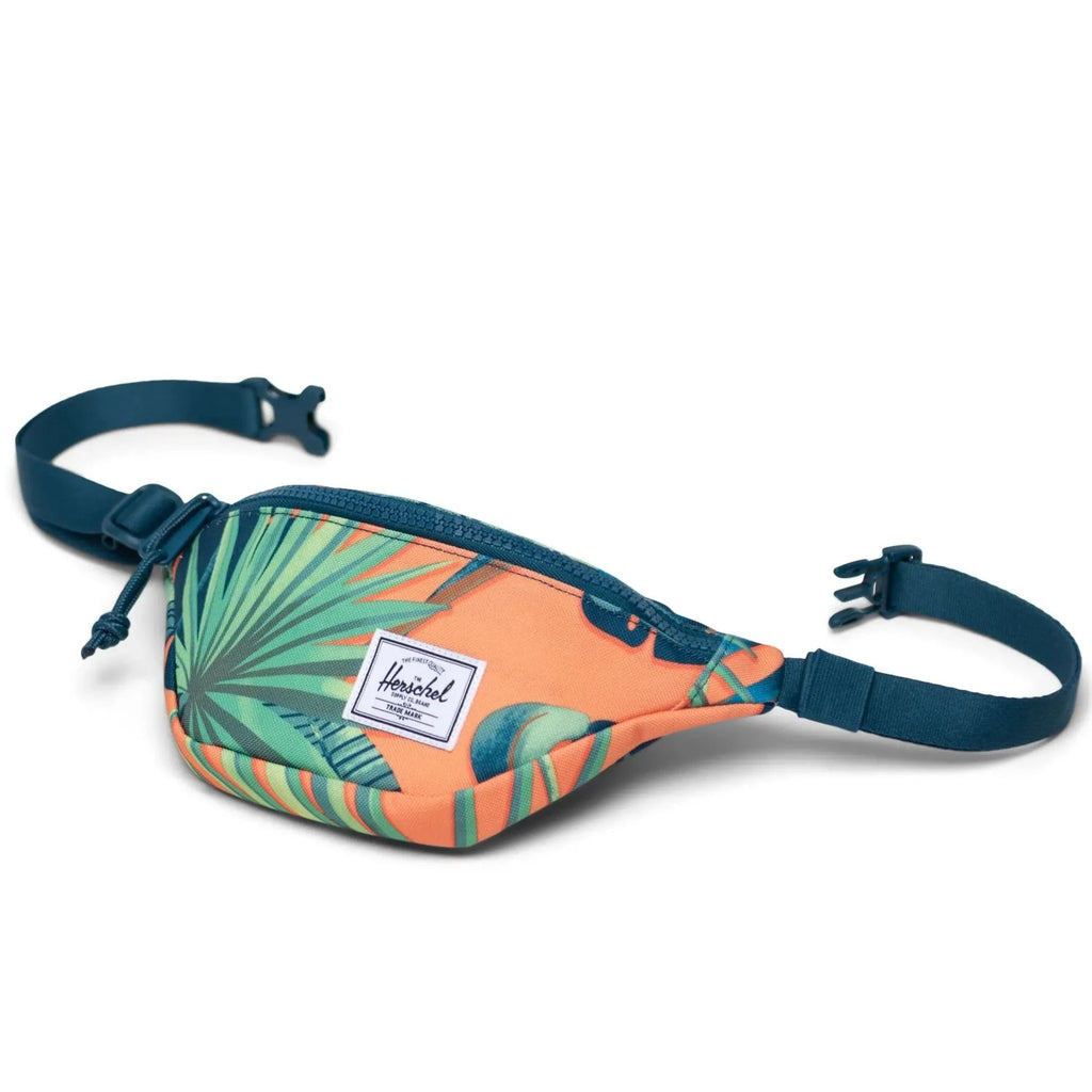 Herschel Heritage Kids Tangerine Palm Leaves print Hip Pack | Green Accents | Can be worn around waist or cross-body - front of bag