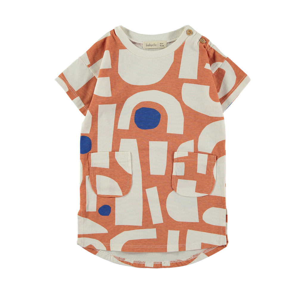 Terra Cotta Color Geometric Print Summer T-shirt Dress | Organic Cotton | short Sleeve | Button close at shoulder | front of dress