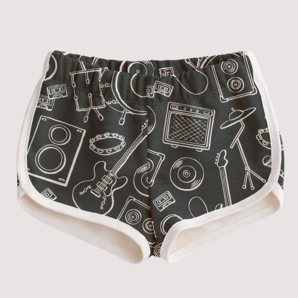 Rock band print french terry kids shorts, white piping trim, elastic waist, super comfort for summer play. Sizes 2-10 yrs