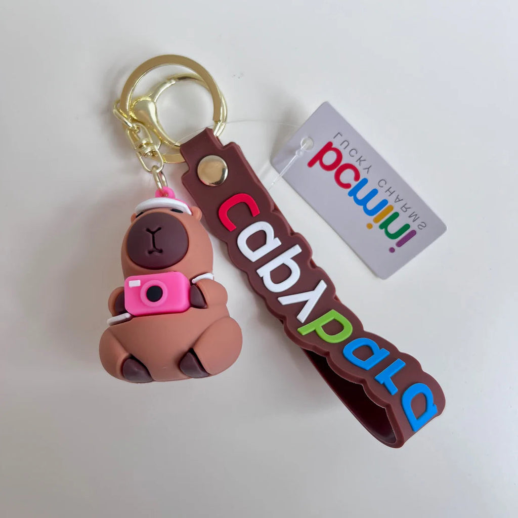 6 unique styles of capybara keychains/ bag charms | holding a camera