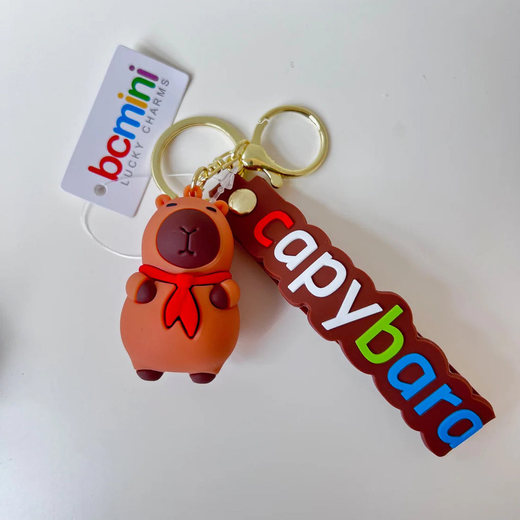 6 unique styles of capybara keychains/ bag charms | wearing red tie