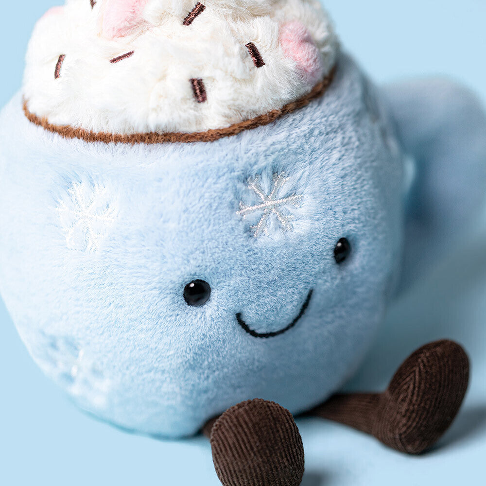 Jellycat Hot Chocolate with Marshmallow Topping | 6" sitting height | blue cup with embroidered snowflakes | white marshmallow top with sprinkles | close up
