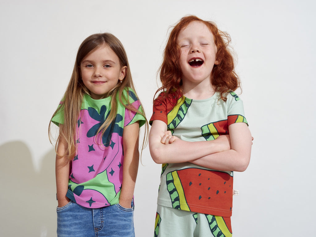 Giant strawberry print tee | shorter sleeve | open at waist | Bright green and strawberry red | kids size 2-10 yr