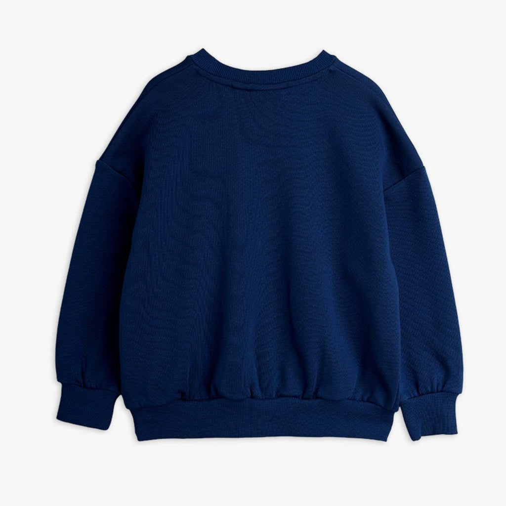 Navy blue cotton sweatshirt ith large bold white skeleton on front | ribbing at neck, wrist, and waist | drop shoulders | back of shirt