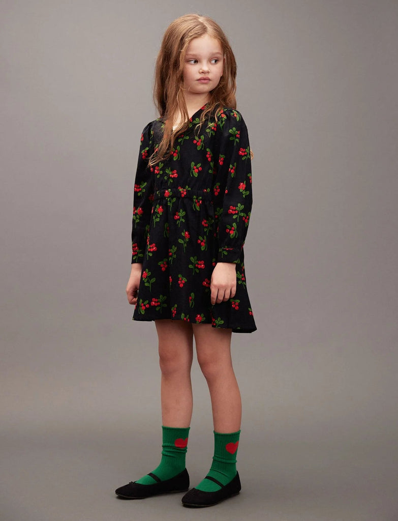 Black dress with all-over lingonberry print in rec/blue | long sleeves | wide elastic waist | 3-button front | modeled