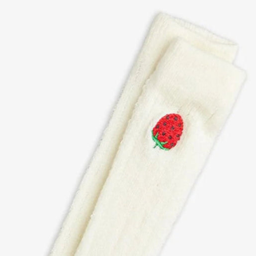 White cottom footless leggings with embroidered strawberry at the ankle | pointelle woven design