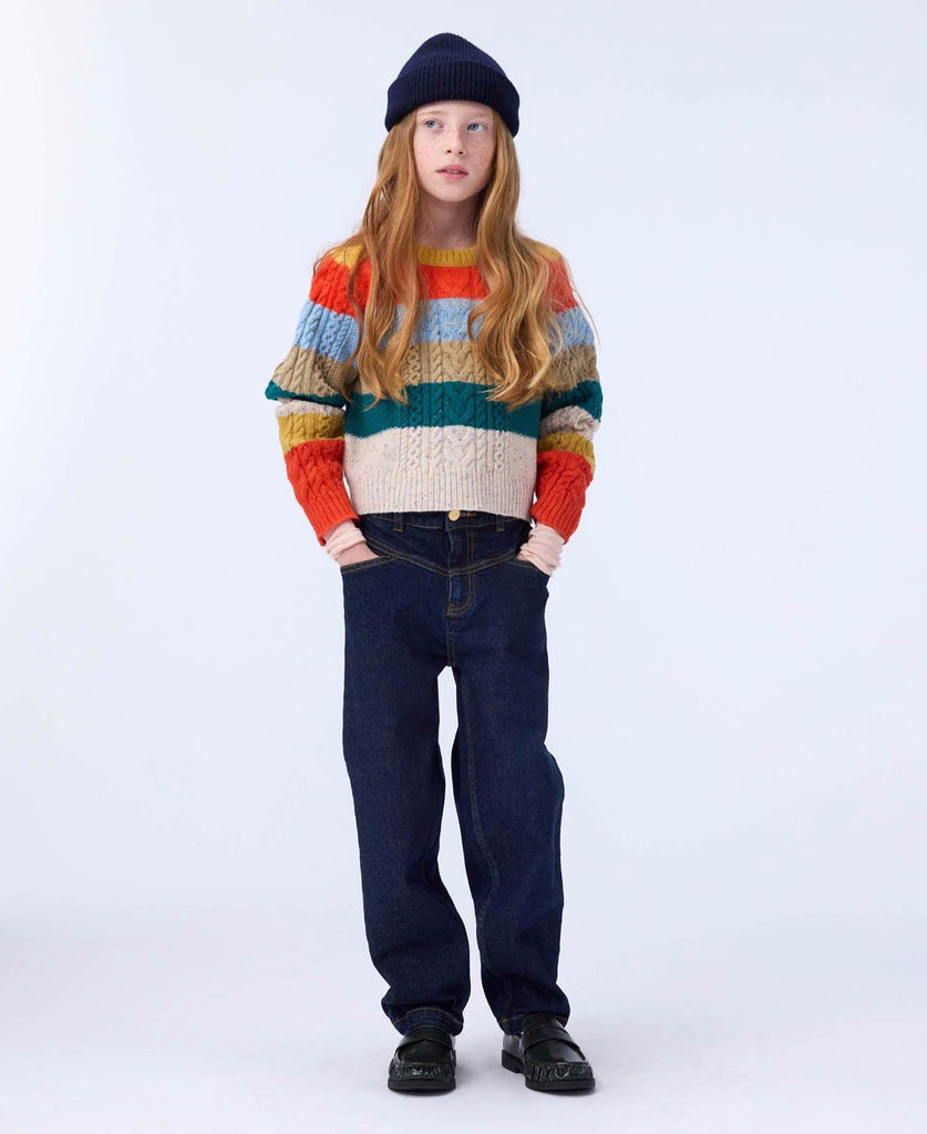 Colorful all wool striped sweater with a cable knit pattern | slightly cropped length | cold wash, lay dry | mustard, orane,baby blue, forest green and ecru stripes | modeled