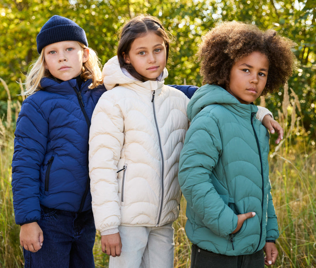 Mist green puffer jacket in sizes 2 thru 14 years | recycled nylon | removable hood | zipper pockets | machine washable | stand-up collar 