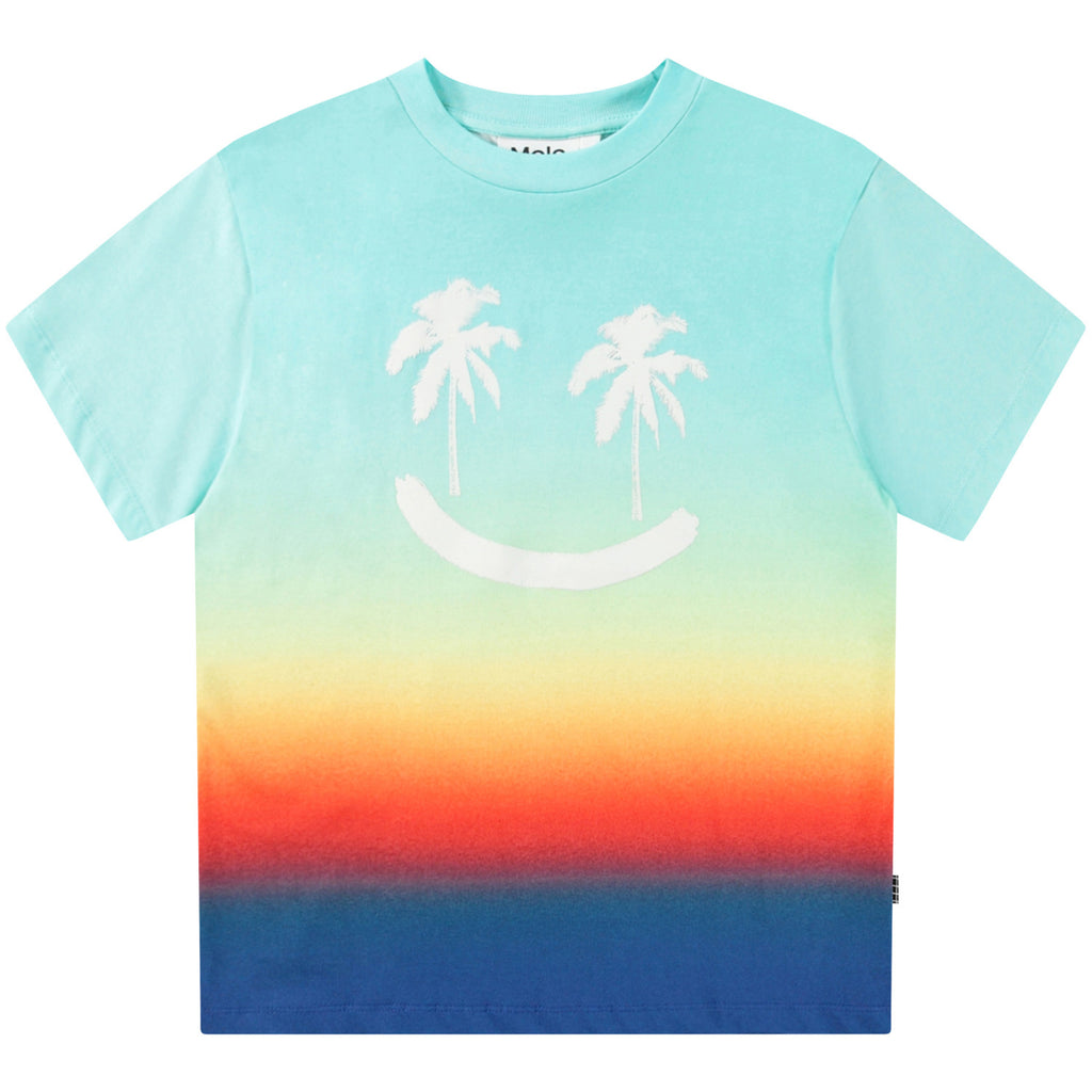 A short-sleeved Molo tee shirt with a 'Palm Smile' design featuring a smiling face with palm trees in the center, gradient of colors from blue to orange at the bottom, and a small Molo logo at the lower right corner.