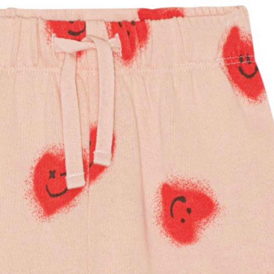 Happy Hearts Organic Cotton Sweatpant | Sizes 3m-4y | Elastic & drawstring pant | Ribbed at ankles | Red Hearts on pink - closeup