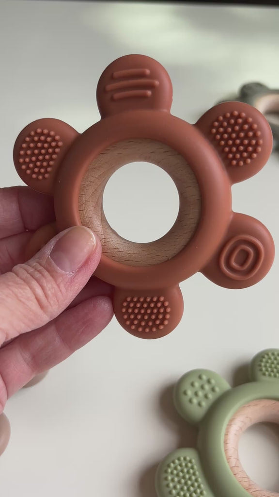 Textured BPA free silicone teether on wooden rin | separates for easy cleaning| 4 colors | sold separately | sensory stimulation