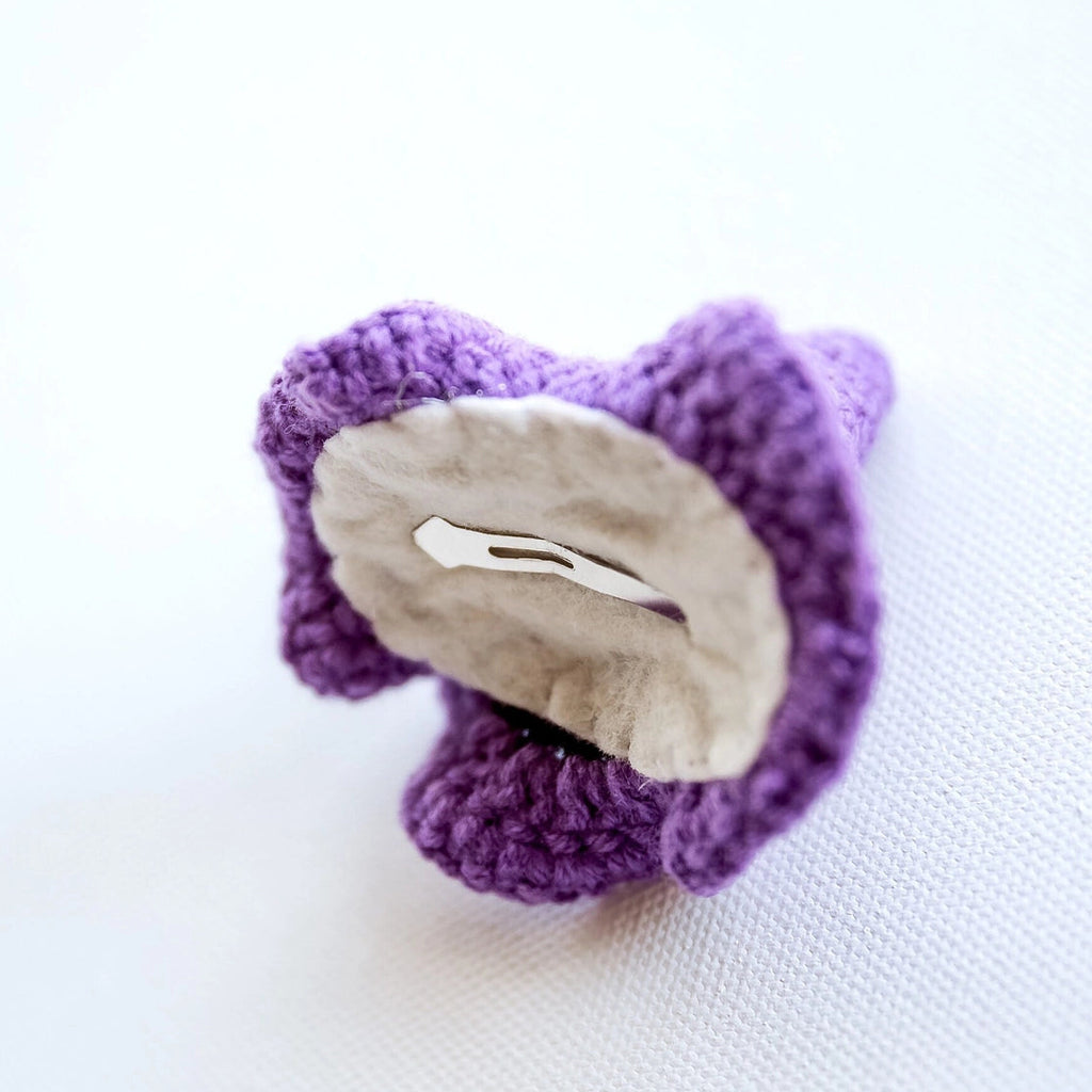 Purple witches hat infant/toddler hair clip | 2.5x2.5" | metal snap clip | perfect for introduction to Halloween dressup | showing the clip