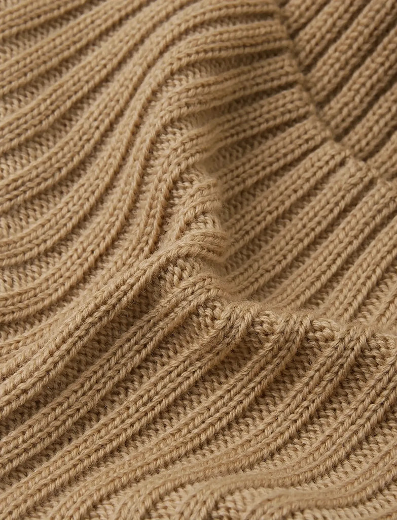 Kids Merino Wool hat with ear covers | lined with fleece for comfort and wind protection | beige | Perfect winter protection | closeup