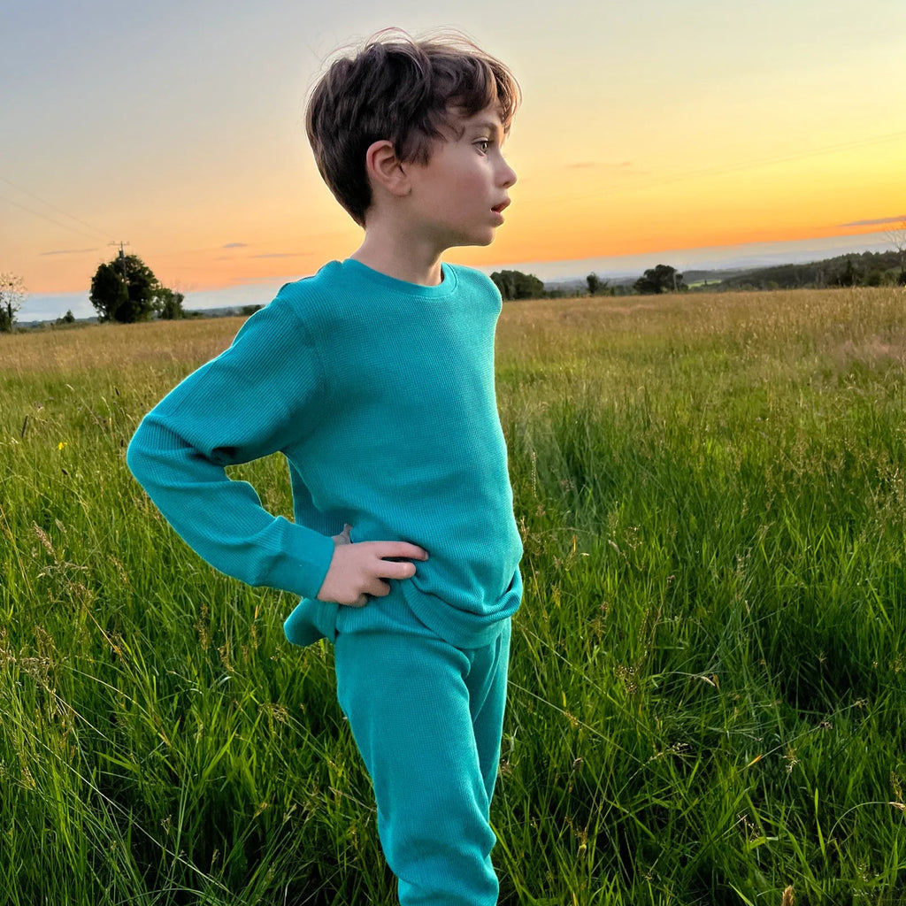 Teal waffle top and bottom set | ribbing at wrist and ankles | stretchy and comfortable anytime | can be a base layer or stand on its own