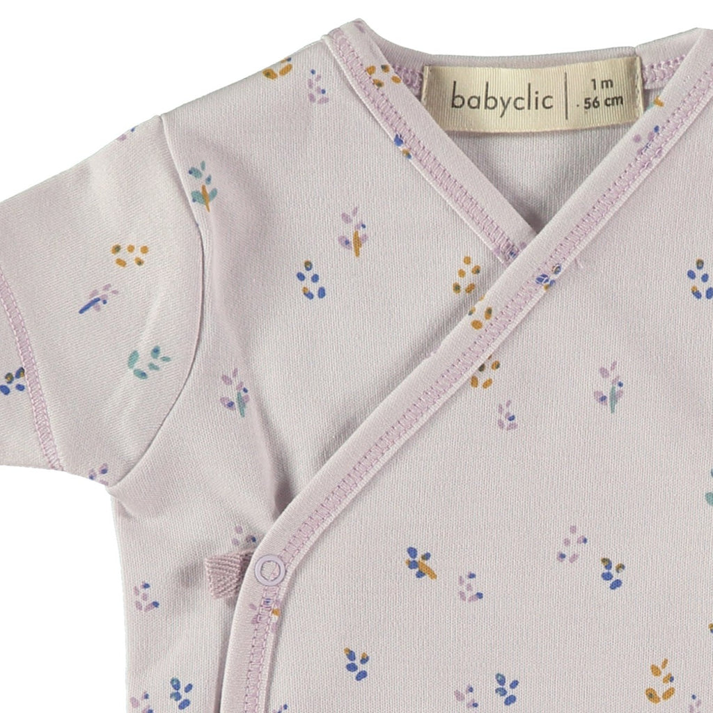 Babyclic Organic Wrap Infant Onesie | Newborn gift | Grey with hints of flowers - closeup